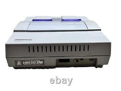 Ensemble de contrôle de la console Super Nintendo SNES avec jeux et manette propre