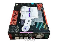 Ensemble de contrôle de la console Super Nintendo SNES avec jeux et manette propre