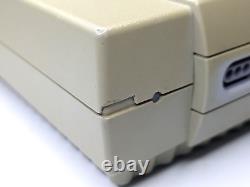 Lot Nintendo SNES 8 jeux + 2 manettes, Super Mario Kart, testé fonctionne