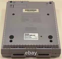 Lot de console système Super Nintendo SNES avec 2 manettes, 10 jeux, Game Genie CIB