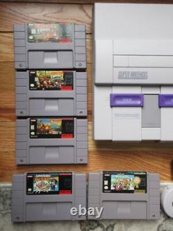Pack Console Super Nintendo SNES DKC 123, Mario Kart, 100% OEM excellent état