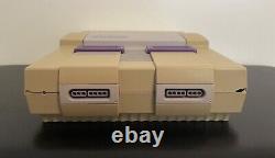Pack Super Nintendo SNES avec 6 jeux, 1 manette et guide du joueur
