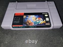 Street Fighter Alpha 2 Authentique Super Nintendo SNES en excellent état complet avec boîte