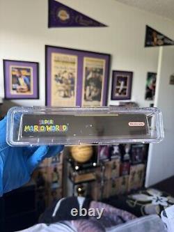 Super Mario World (Super Nintendo Entertainment System SNES, 1991) WATA 7.5 CIB<br/> 	 <br/>
	Super Mario World (Super Nintendo Entertainment System SNES, 1991) WATA 7.5 CIB