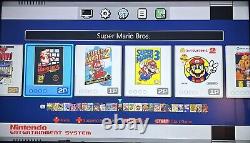 Super Nintendo Classic Mini authentique modifié, piraté, avec plus de 400 jeux NES et SNES.