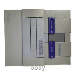 Super Nintendo Entertainment System Orig SNES Console SNS-001 Video Game Bundle translated in French would be: 'Super Nintendo Entertainment System - Console d'origine SNES SNS-001 avec ensemble de jeux vidéo'