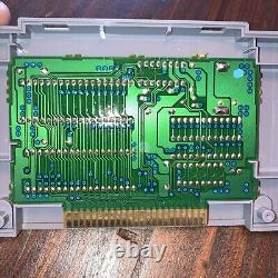 Super Nintendo SNES Console de salon grise. Livré avec une nouvelle manette et des jeux.