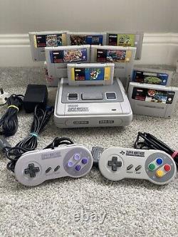 Super Nintendo SNES ÉNORME bundle console 2 manettes 8 jeux Mario Street Fighter DK CL3