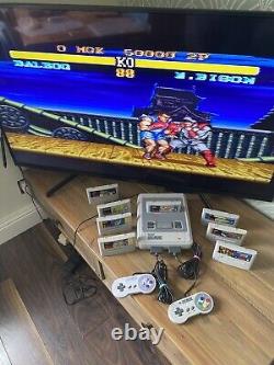 Super Nintendo SNES ÉNORME bundle console 2 manettes 8 jeux Mario Street Fighter DK CL3