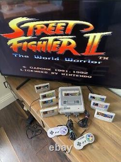 Super Nintendo SNES ÉNORME bundle console 2 manettes 8 jeux Mario Street Fighter DK CL3