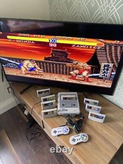 Super Nintendo SNES ÉNORME bundle console 2 manettes 8 jeux Mario Street Fighter DK CL3