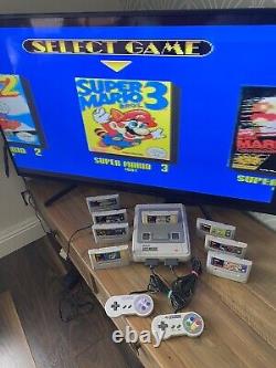 Super Nintendo SNES ÉNORME bundle console 2 manettes 8 jeux Mario Street Fighter DK CL3