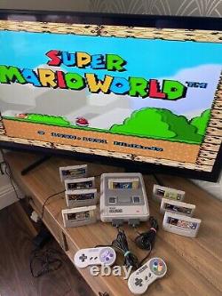 Super Nintendo SNES ÉNORME bundle console 2 manettes 8 jeux Mario Street Fighter DK CL3
