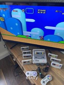 Super Nintendo SNES ÉNORME bundle console 2 manettes 8 jeux Mario Street Fighter DK CL3