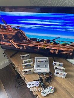 Super Nintendo SNES ÉNORME bundle console 2 manettes 8 jeux Mario Street Fighter DK CL3