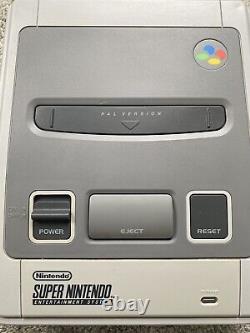 Super Nintendo SNES ÉNORME bundle console 2 manettes 8 jeux Mario Street Fighter DK CL3