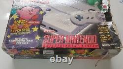 Super Nintendo SNES Mini Slim Kirby Super Star Exclusive translates to: Super Nintendo SNES Mini Slim Kirby Super Star Exclusif.