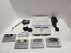 Super Nintendo-snes Avec Une Manette Et Quatre Jeux