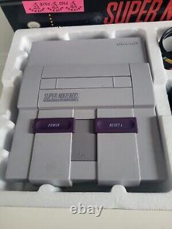 Système Super Nintendo complet dans la boîte SNES avec console Mario testée et fonctionnelle