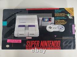 Système Super Nintendo complet dans la boîte SNES avec console Mario testée et fonctionnelle