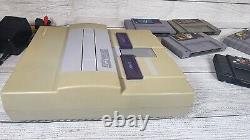 Système de jeu Super Nintendo SNES avec 5 jeux testés et fonctionnant