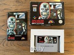 Terminator 2 T2 Le jeu d'arcade Super Nintendo SNES Boîte avec Manuel.