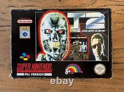 Terminator 2 T2 Le jeu d'arcade Super Nintendo SNES Boîte avec Manuel.