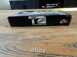 Terminator 2 T2 Le jeu d'arcade Super Nintendo SNES Boîte avec Manuel.