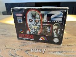 Terminator 2 T2 Le jeu d'arcade Super Nintendo SNES Boîte avec Manuel.