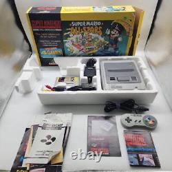 Traduction en français: Édition PAL de Super Mario All Stars pour le système de divertissement Super Nintendo (SNES)